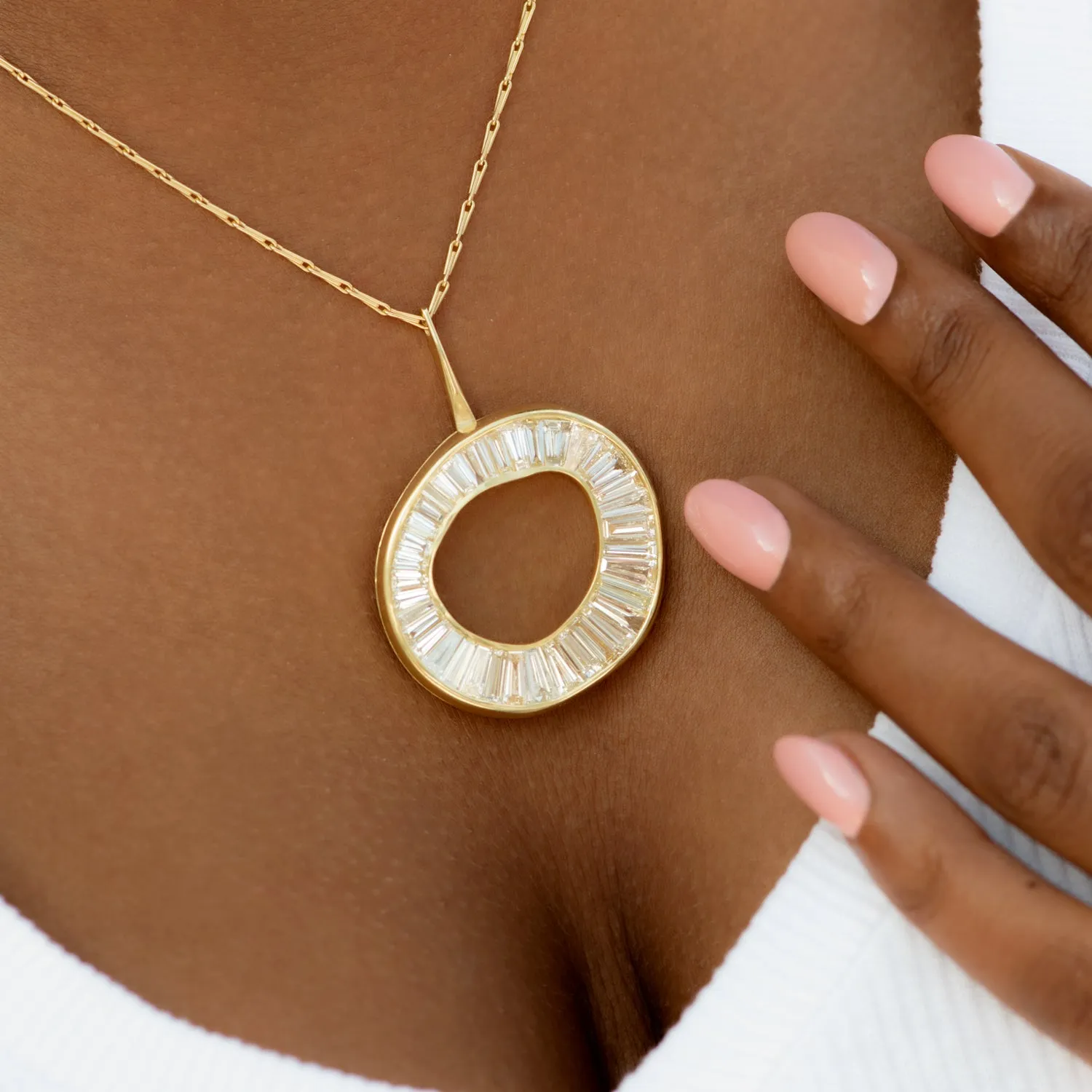 Baguette Diamond Necklace with a Fluid Sphere Pendant