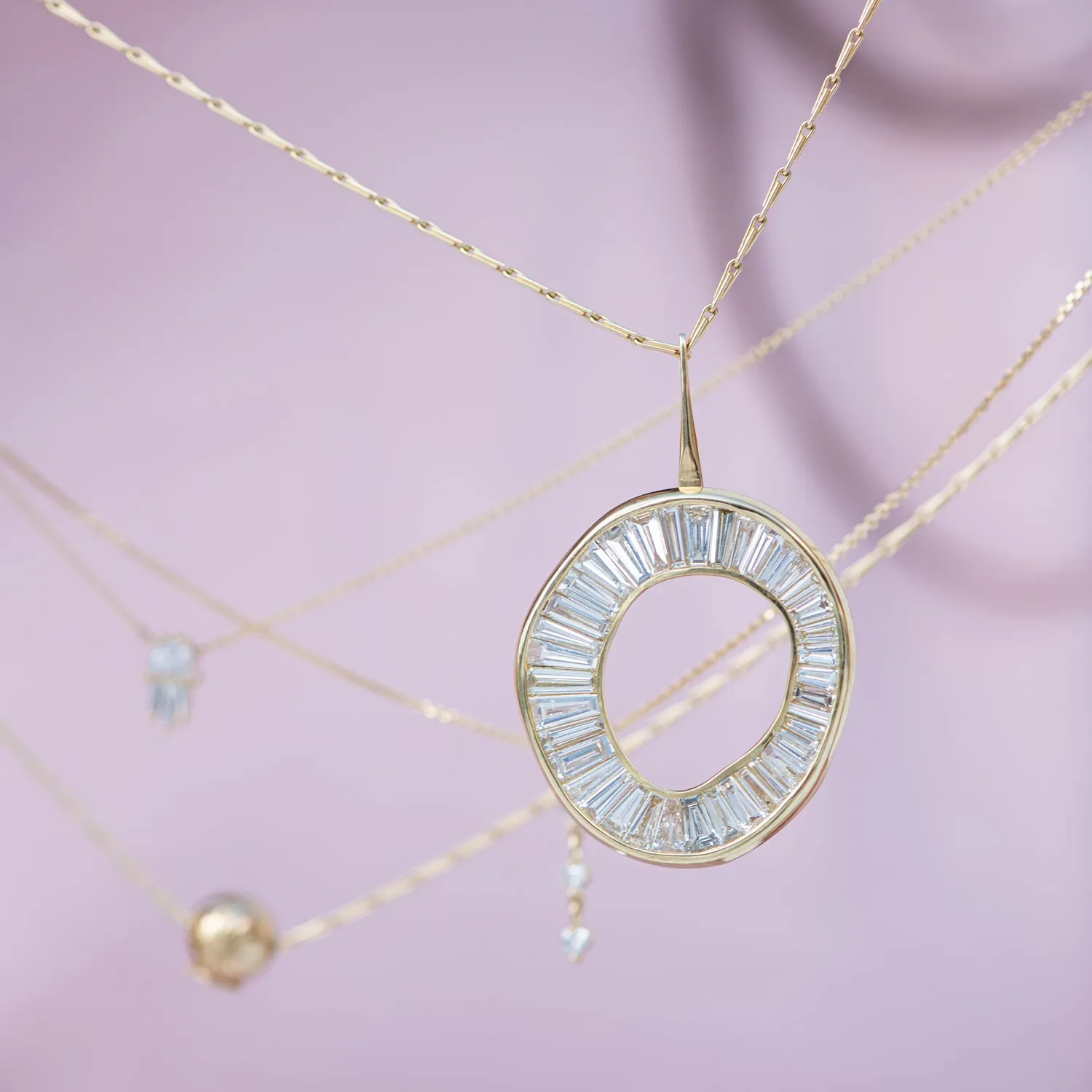 Baguette Diamond Necklace with a Fluid Sphere Pendant