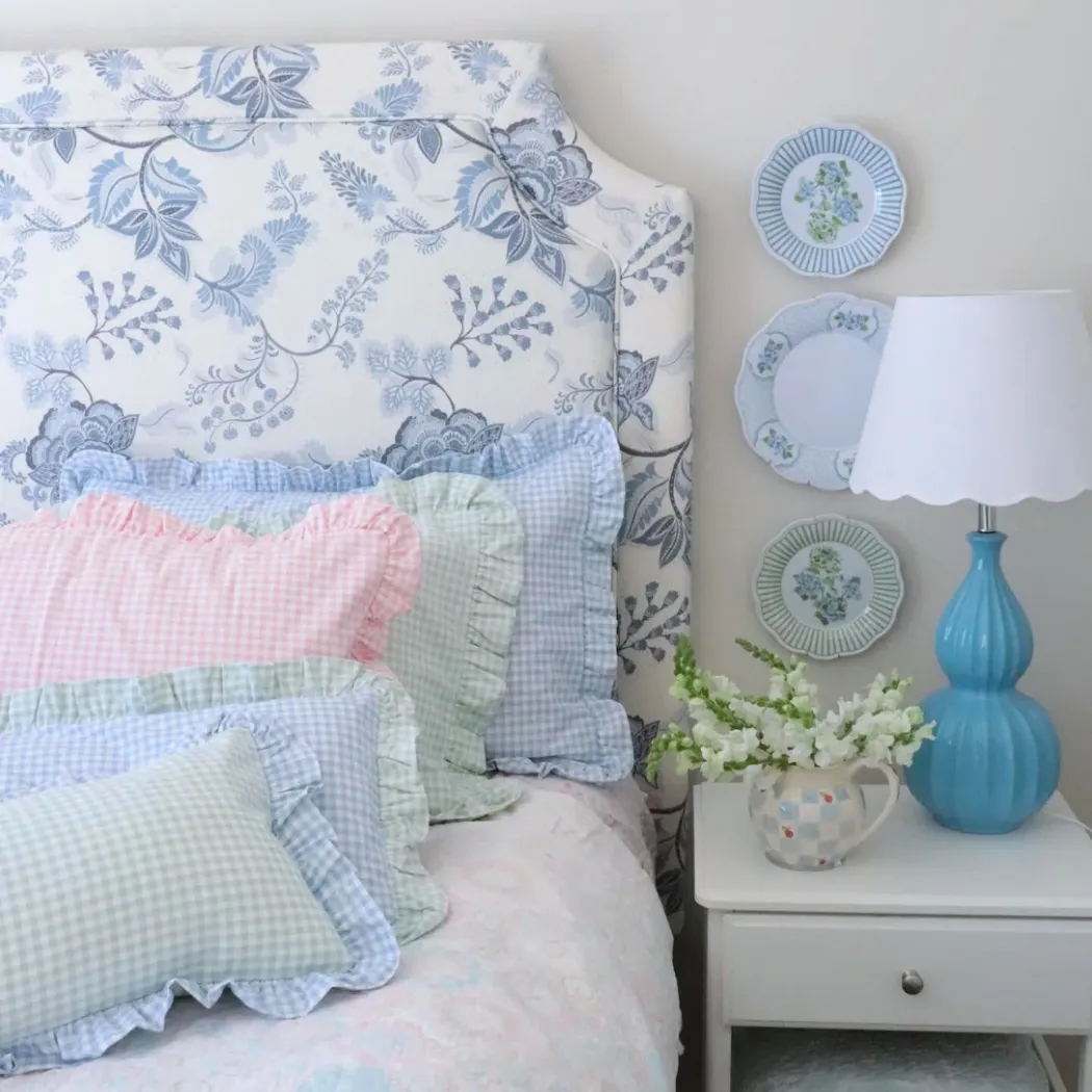 Blue gingham frilled cushion