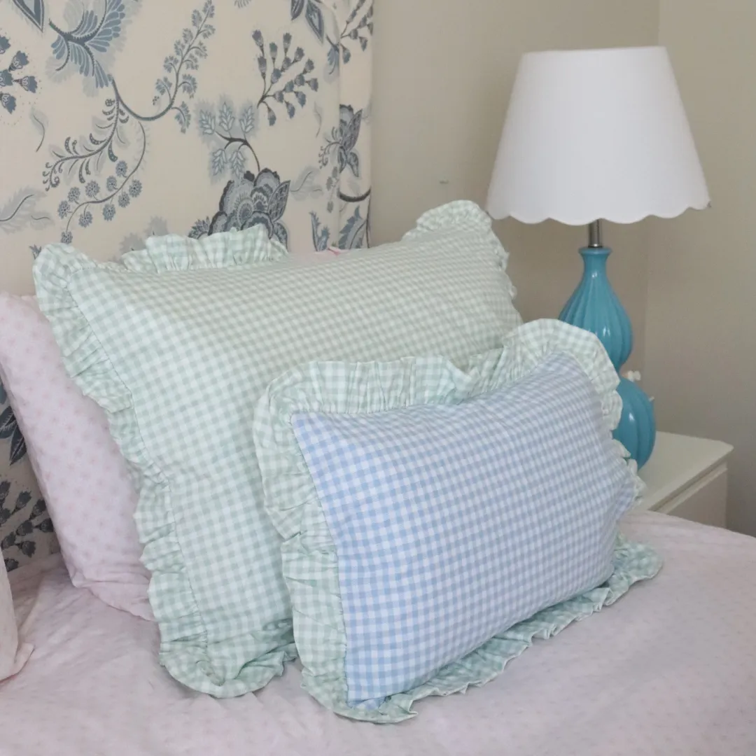 Blue gingham frilled cushion