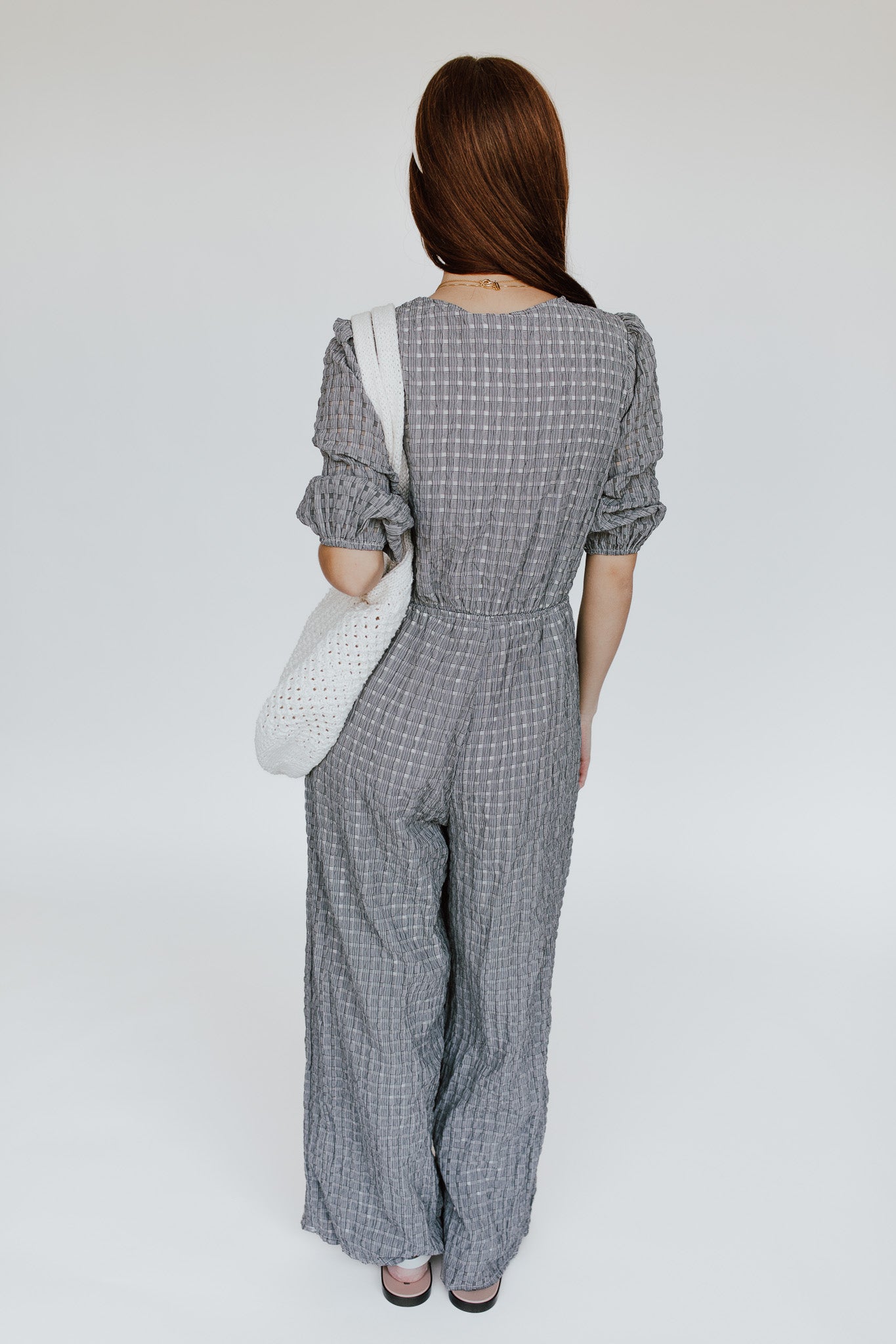 The Prowell Gingham Woven Jumpsuit in Black Multi