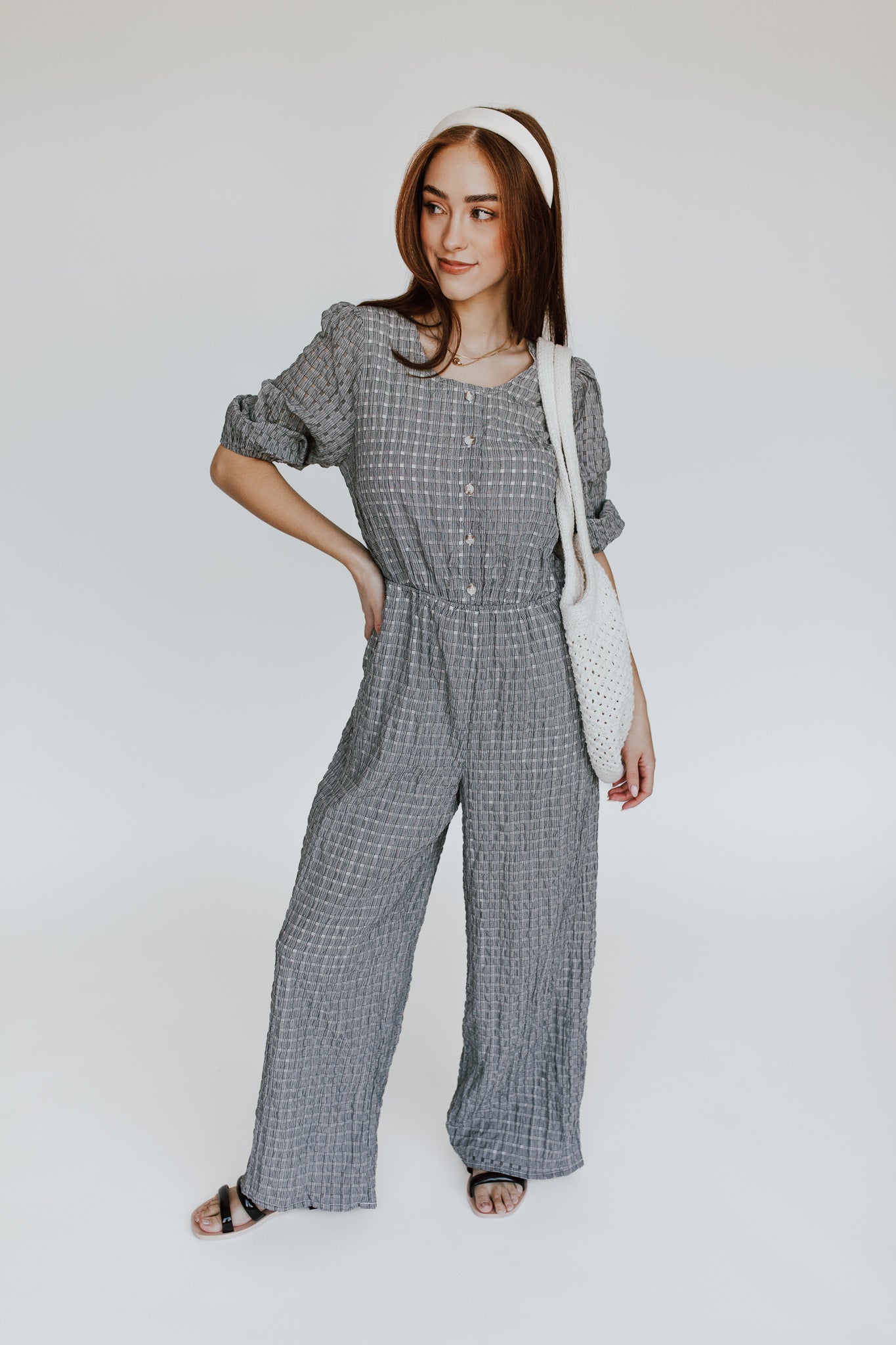 The Prowell Gingham Woven Jumpsuit in Black Multi