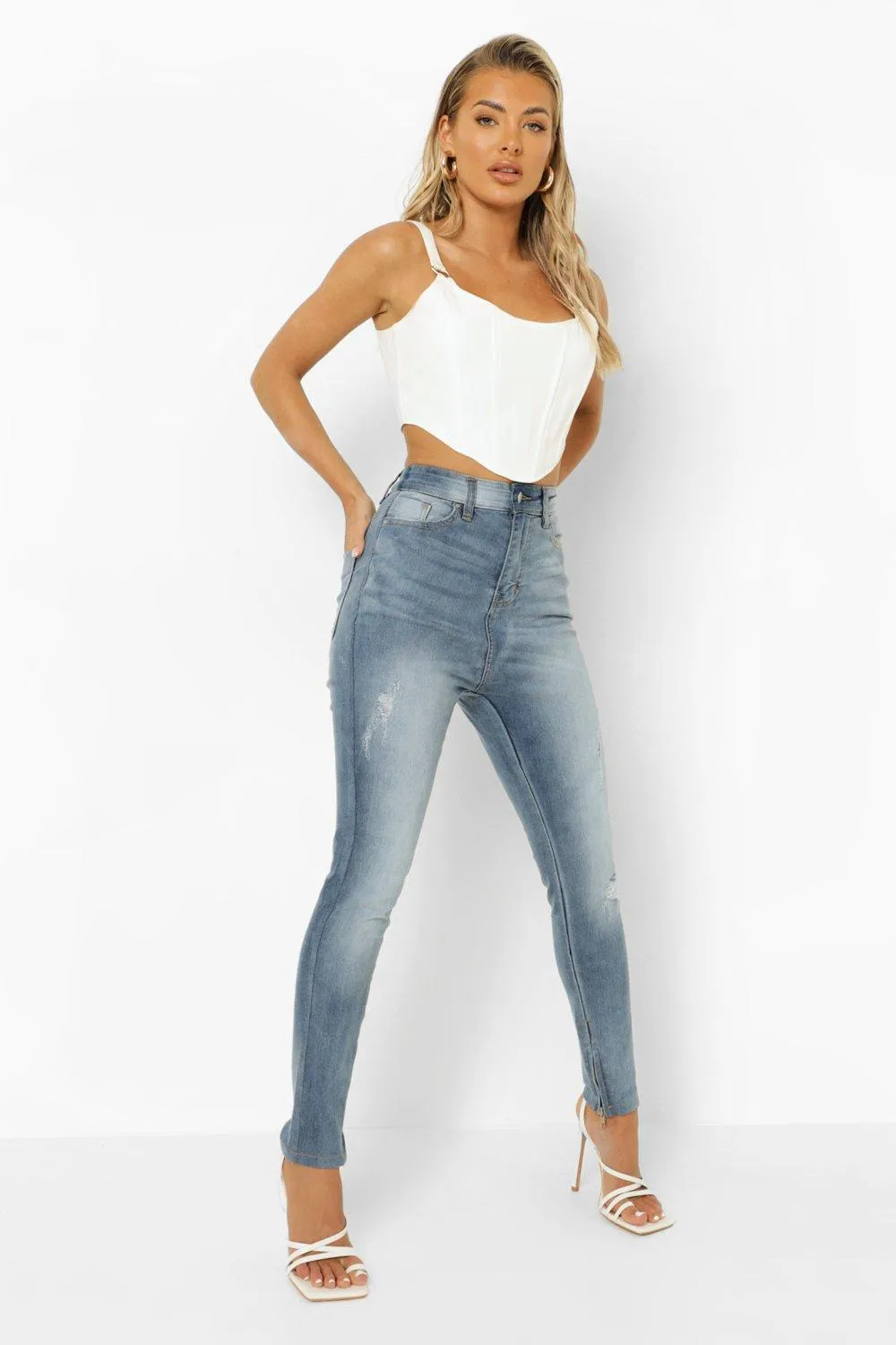 Washed Denim Skinny Jeans With Zip Hem